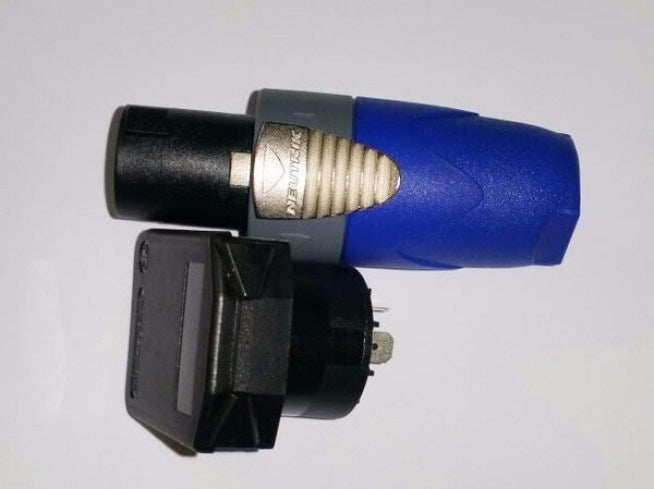 Charging port connector with a cap